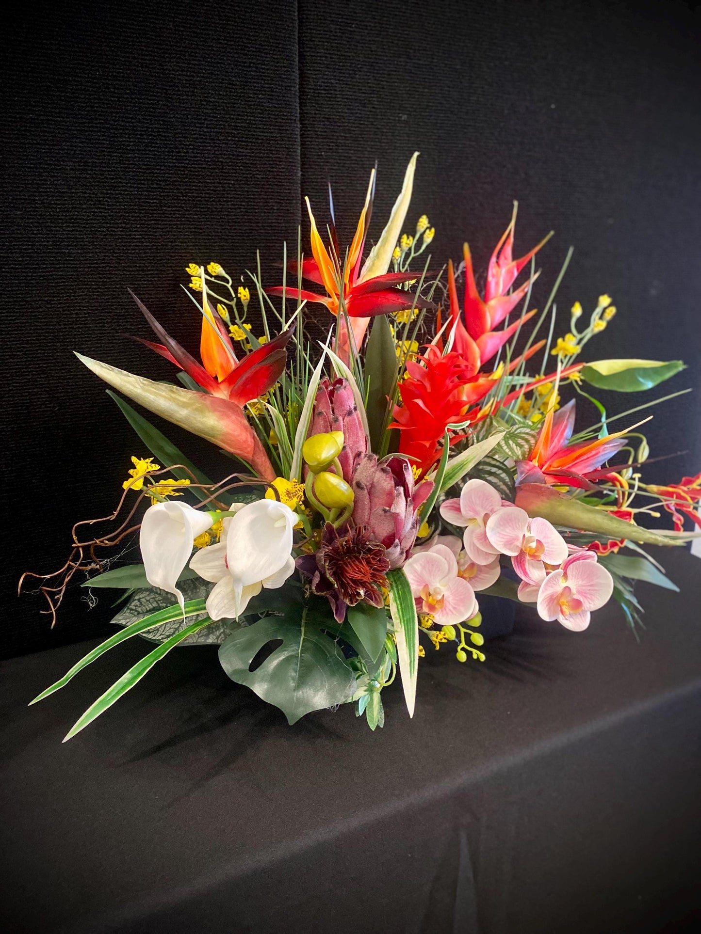 Bird of Paradise and  Heliconia  in Black Ceramic Vase. Tropical Centerpiece with  Artificial Arrangement. 26Wx18Hx15D