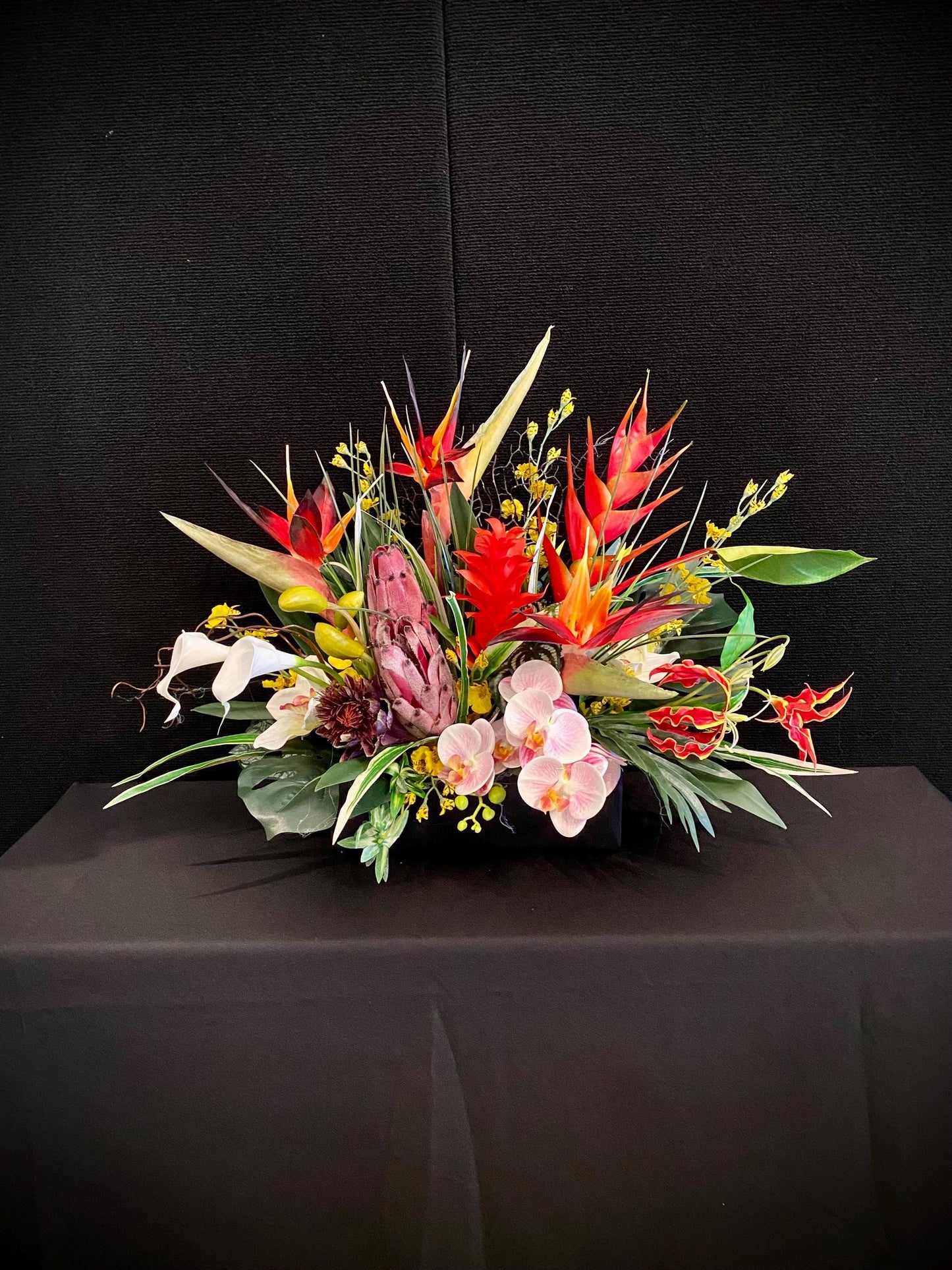 Bird of Paradise and  Heliconia  in Black Ceramic Vase. Tropical Centerpiece with  Artificial Arrangement. 26Wx18Hx15D