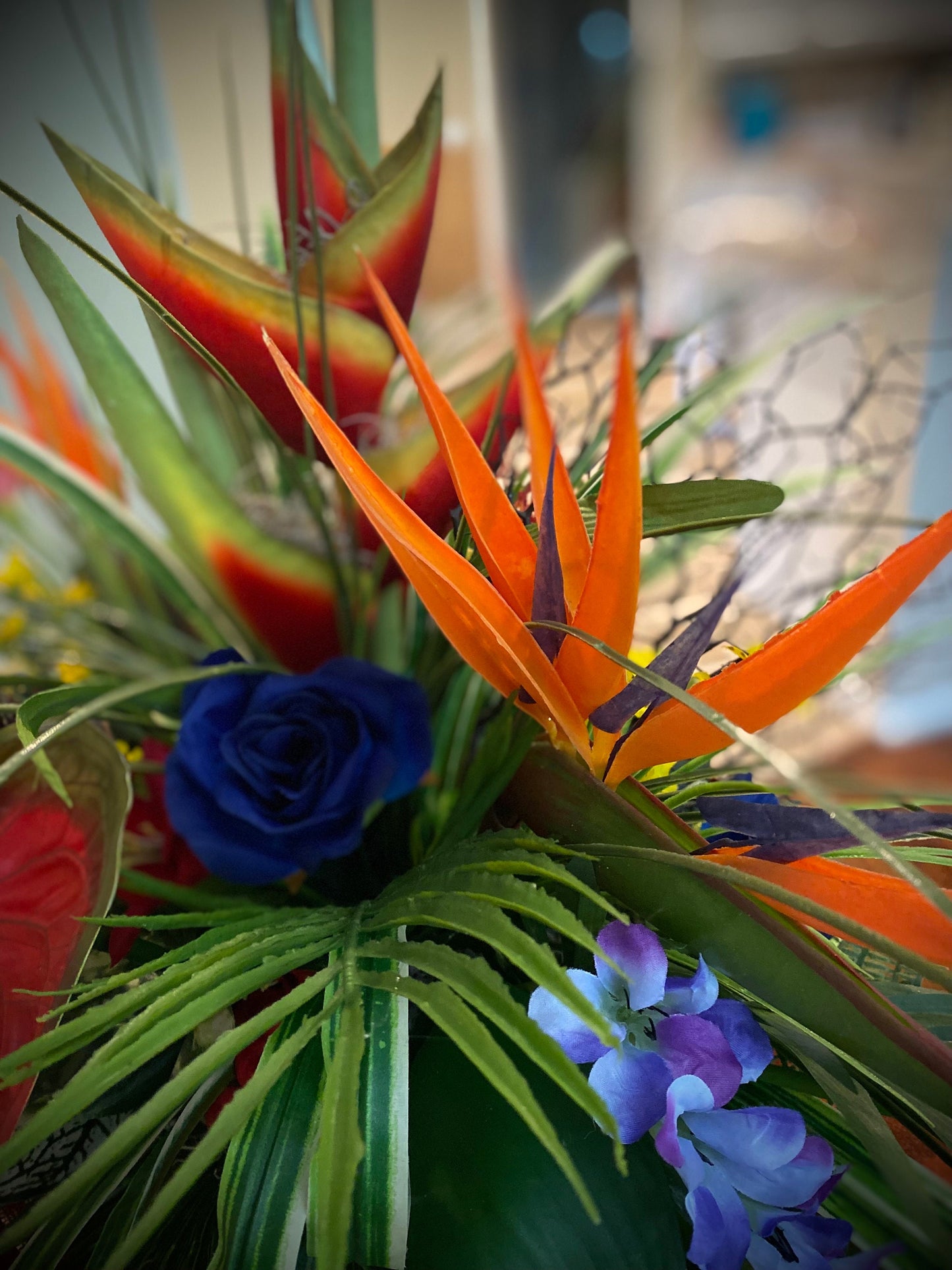 Heliconia and Blue Paradise Accent. Amazingly life like Arrangement. Artificial. Bird of paradise, Orchid and Coral fan. 30"x16"x17" h
